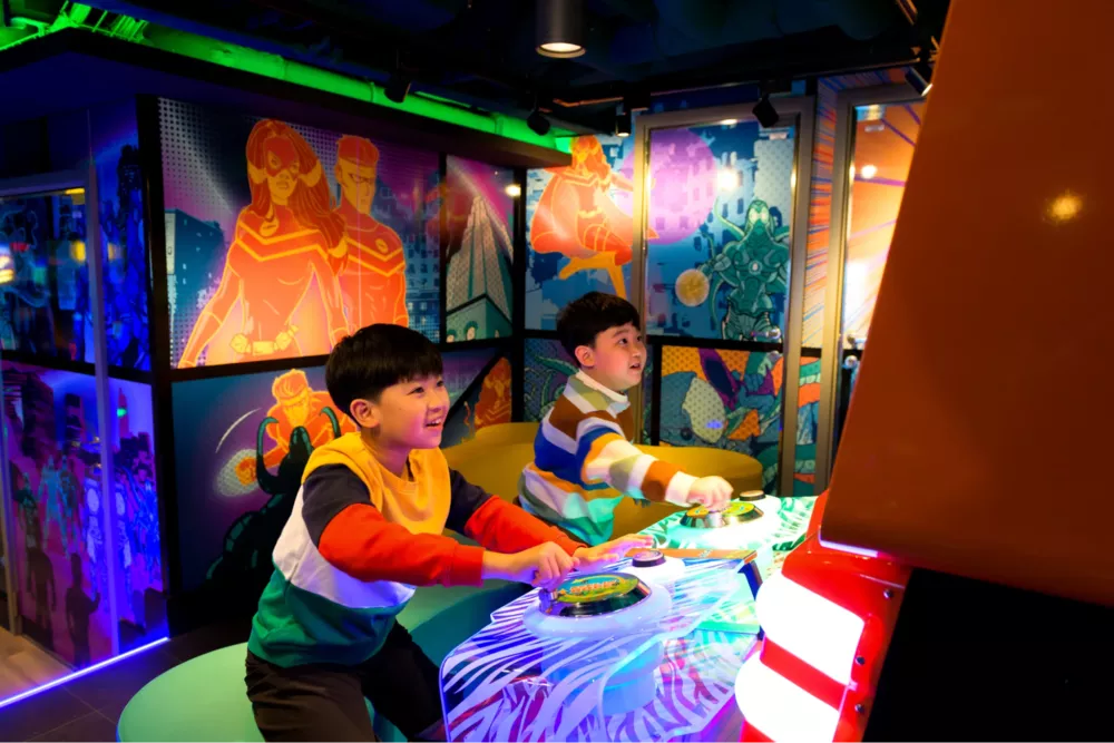 Kids Enjoying Arcade Games
